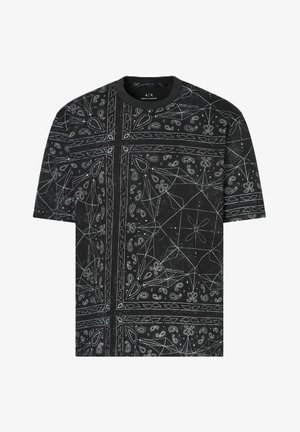 T-shirt nera con intricati motivi bianchi a paisley e geometrici, colletto rotondo e maniche corte. Tessuto in cotone con una superficie liscia.