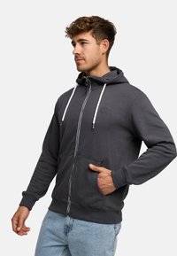 Hooded zip-up sweatshirt in donkergrijze katoenmix met witte trekkoorden, kangoeroe-pocket en logo-detail op de borst.