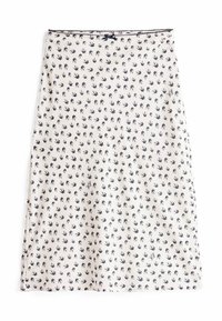Gonna di tessuto bianco con motivo di uccelli navy su tutta la superficie. Design slim e dritto, rifinito con una delicata bordatura in pizzo lungo la vita.