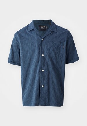 Navy short-sleeve shirt with a textured floral pattern, white buttons, and a chest pocket. Made from lightweight fabric.