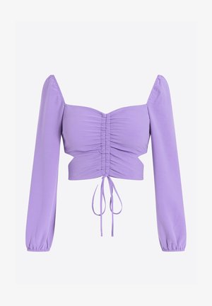 Haut court lilas avec manches longues bouffantes, doté d'un devant froncé et d'une fermeture réglable par lien. Tissu lisse et doux avec une coupe structurée.