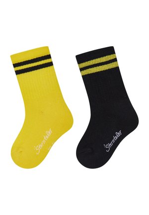 One yellow and one black sock, each with two horizontal stripes near the cuff and white text on the foot area.