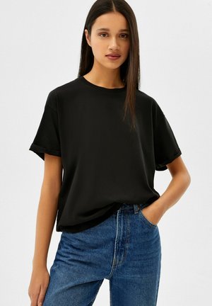 Schwarz shirt - Der Favorit der Redaktion