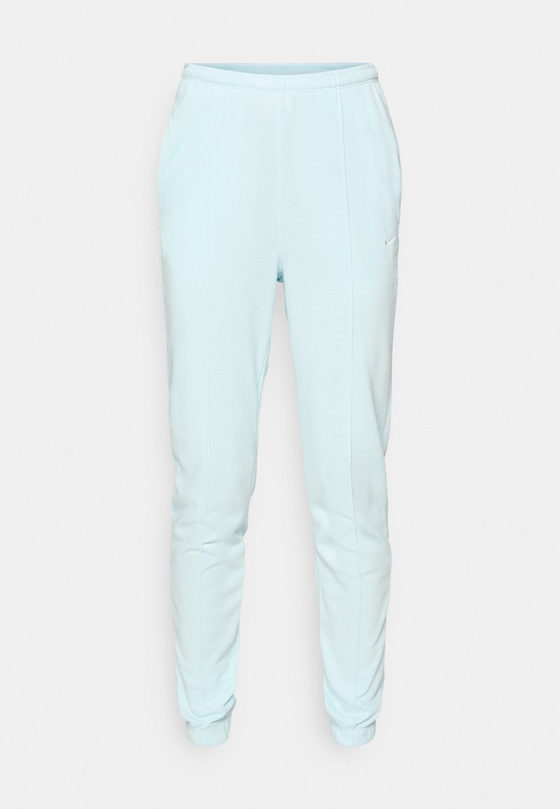 Pantalones deportivos de color azul claro, confeccionados en tela suave, con cinturilla elástica, ajuste ajustado y tobillos acampanados. Las costuras laterales son visibles.