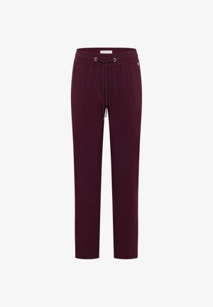 Bordowe spodnie dresowe z elastycznym pasem i sznurkiem, prostymi nogawkami oraz subtelnym metalowym logo z boku.