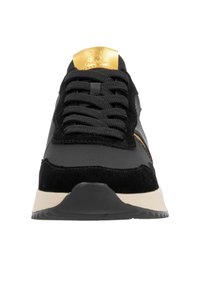 Black and gray sneaker with suede and synthetic upper, featuring a gold accent on the tongue, black laces, and a contrasting white sole.