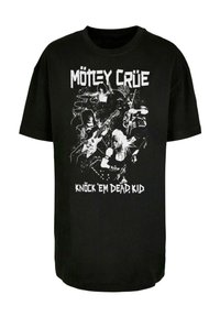 Juodas medvilnės marškinėliai su baltu muzikantų su instrumentais piešiniu ir tekstu "MÖTLEY CRÜE KNOCK 'EM DEAD, KID" viršuje.