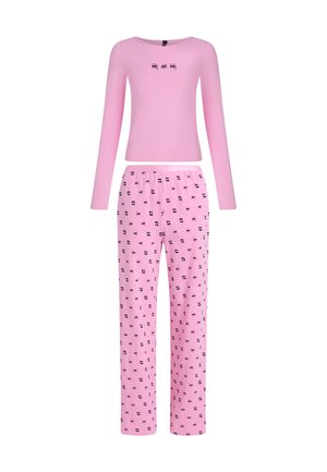 Rosa Langarmoberteil mit drei kleinen schwarzen Grafiken, kombiniert mit rosa Schlafanzughosen, die ein sich wiederholendes schwarzes Muster aufweisen. Aus weichem Baumwollmaterial.