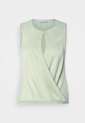 Varrukateta helesinine topp, millel on ees avaus, pehme tekstuur ja langenud disain. Valmistatud siledast, venivast kangast.