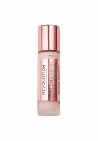 Revolution Conceal & Define full coverage foundation i en klar flaska med en frostad nedre del och ett glänsande roseguld lock. Nyans FO.5.