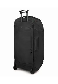 Black wheeled suitcase made of durable fabric, featuring a textured design, top and side handles, and a zippered front pocket.