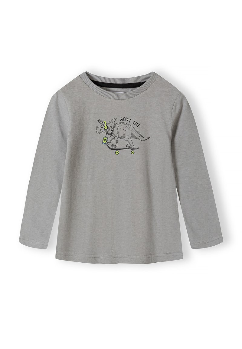 Grå langærmet skjorte med grafik af en triceratops iført høretelefoner og holdende en drik, mens den kører på en skateboard med teksten "SKATE LIFE".