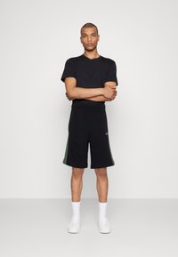 Lacoste COLOR BLOCK - Pantalon de survêtement - abysm sequoia