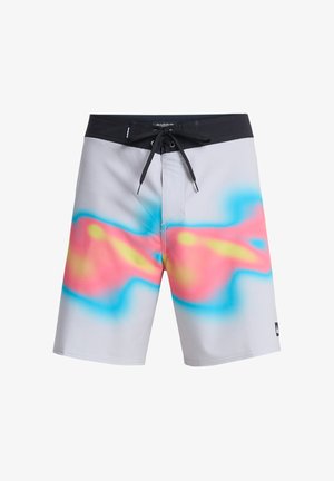 Bañadores de hombre en gris claro, con un vibrante patrón abstracto en rosa, azul y amarillo. Cuentan con una cintura con cordón negro.