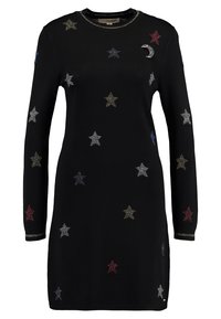 Abito nero in maglia con maniche lunghe, caratterizzato da motivi a stelle multicolore e un accento a forma di luna crescente. Collo rotondo con finitura metallica.