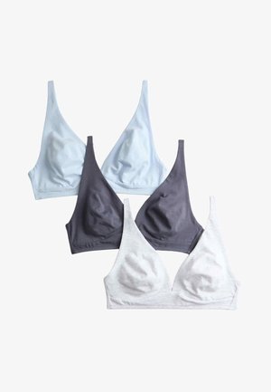 Four soft cotton bralettes in light blue, dark gray, and light gray, arranged overlapping on a white background.