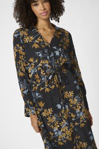 Black floral dress featuring yellow and blue botanical patterns, long sleeves, a button-up front, and a cinched waist with a fabric tie.