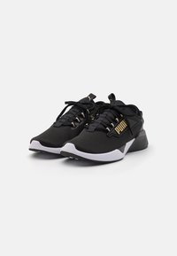 Puma Chaussures de running sur route - gold-coloured
