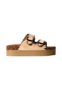 Sandale à plateforme en daim beige avec deux brides ajustables à boucle bordées de noir et une semelle épaisse en liège et caoutchouc.