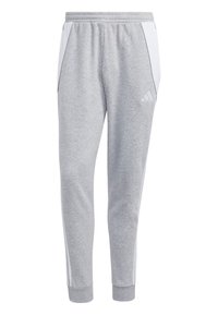 Joggers en coton gris avec des panneaux latéraux blancs, une taille élastique et des poignets. Présentent le logo Adidas sur la cuisse gauche. Convient pour une tenue décontractée.