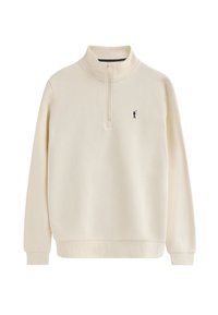 Suéter crema con cuello de media cremallera, material de forro polar suave, puños acanalados y una pequeña figura negra bordada en el lado izquierdo del pecho.