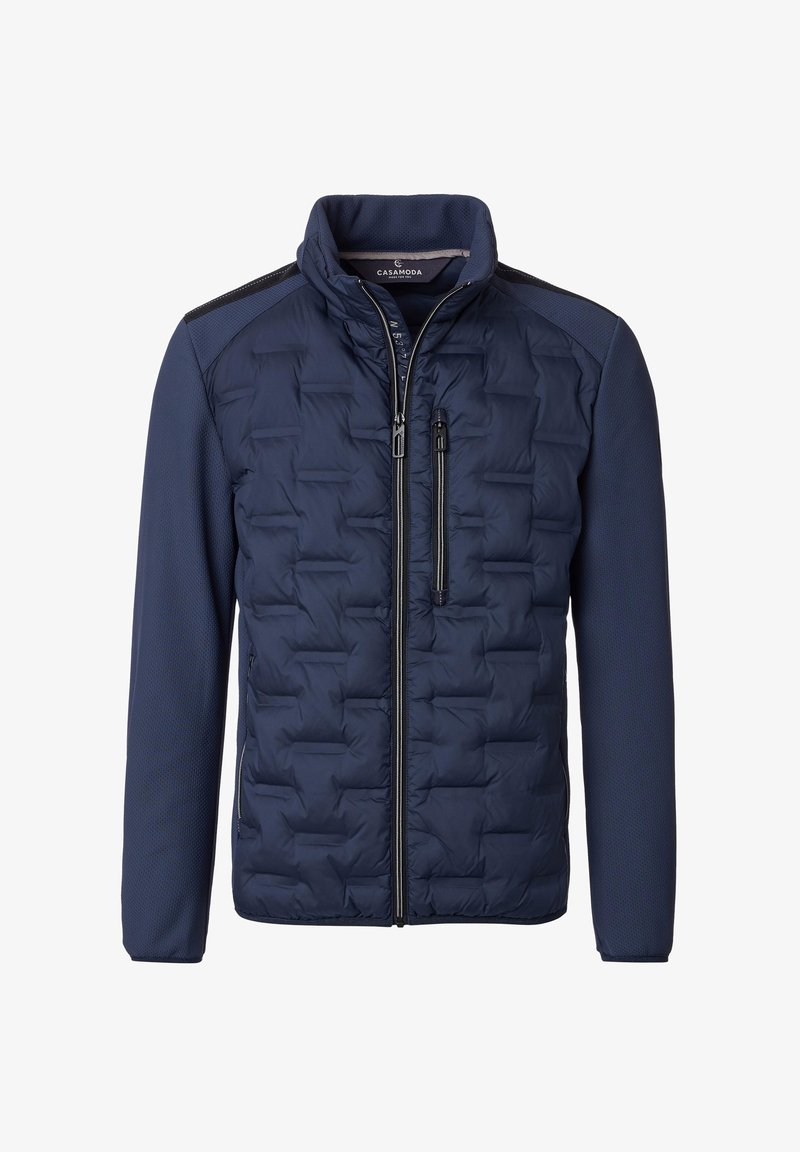 Marineblauwe pufferjas met doorgestikte textuur op het lichaam, gladde mouwen, hoge kraag, ritssluiting aan de voorkant en een met rits afsluitbare borstzak.