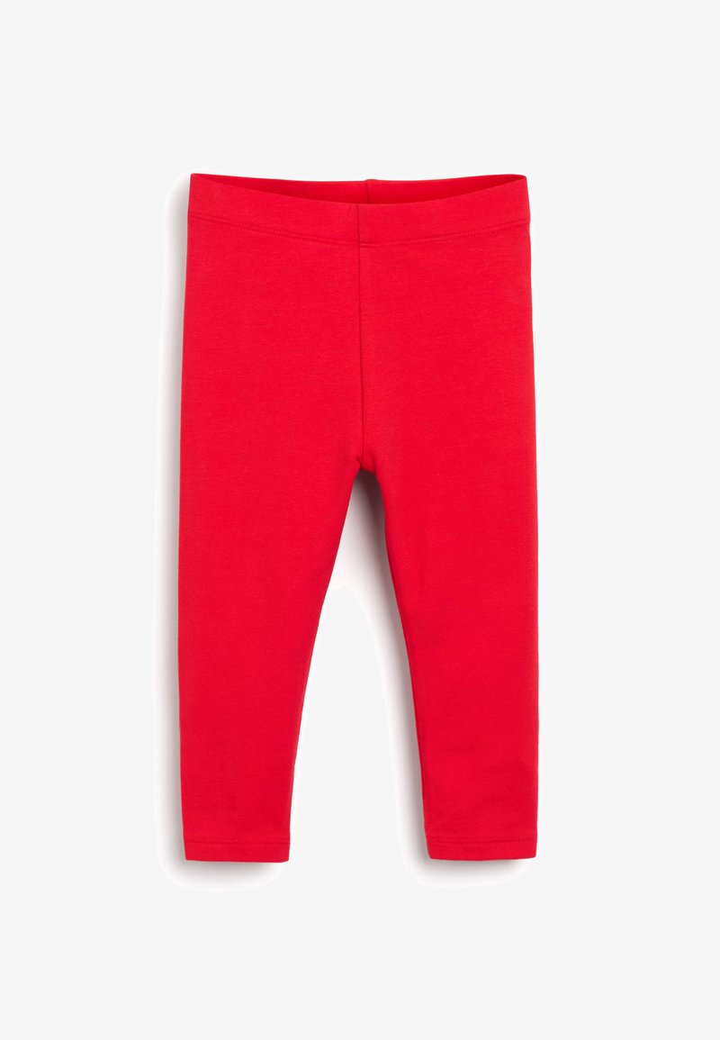 Leggings rouges fabriqués à partir d'un tissu doux et extensible. Ils présentent un design ajusté, une taille élastique et des poignets ourlés. Pas de motifs ni d'ornements.