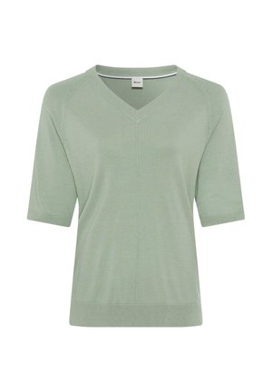 Kurzarmpullover mit V-Ausschnitt in Hellgrün, aus weichem Strickstoff gefertigt. Verfügt über gerippte Kanten und ein dezentes Nahtdetail an den Seiten.