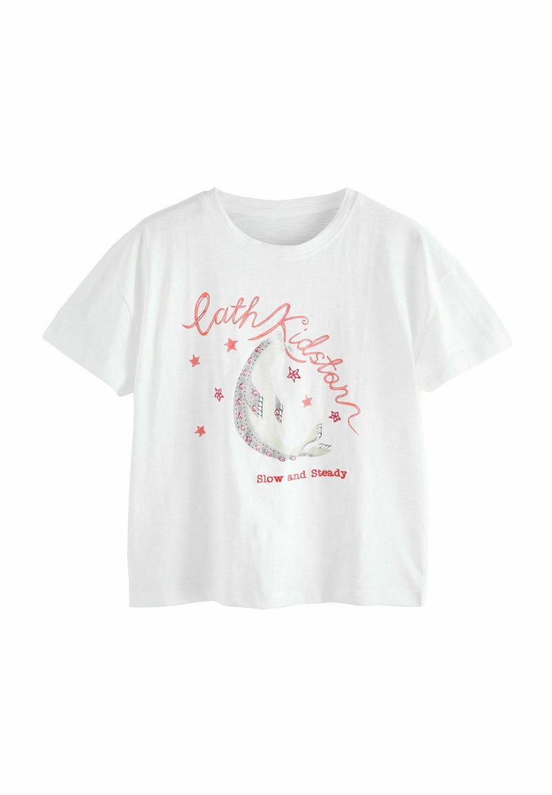 Camiseta de algodón blanca con mangas cortas que presenta un diseño impreso de una luna creciente y estrellas, acompañado del texto "Lento y constante".