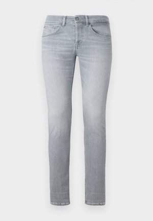 Light gray jeans with a fitted design, constructed from denim. Features include a classic five-pocket style and subtle fading on the legs.