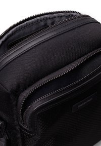 Calvin Klein SMALL REPORTER - Borsa a tracolla - ck black