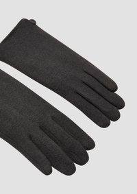 Schwarze gestrickte Handschuhe mit glatter Textur. Zu den Eigenschaften gehören eine eng anliegende Passform und ein Fünf-Finger-Design, geeignet für den Einsatz bei kaltem Wetter.