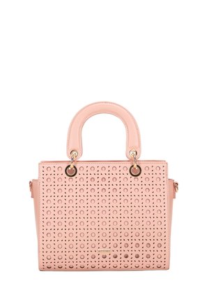Pink handbag with circular and triangular cut-out patterns, rounded handles with gold rings, and small brand plaque on front center.