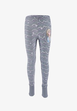 Grijze legging met een golvend patroon in paars en lichtgroen, met een cirkelvormige illustratie van een karakter aan de bovenkant.