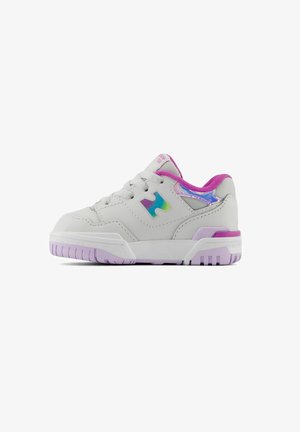 White synthetic sneakers with purple accents, featuring a lace-up design and a shiny iridescent logo on the sides. Textured rubber sole.