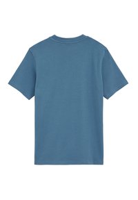 T-shirt med kort ärm i ljusblå bomull. Rund halsringning, avslappnad passform, mjuk textur, inga grafik eller mönster. Bakvy.