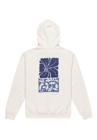Haut à capuche couleur crème avec un motif floral bleu au dos. Texture douce avec une capuche à cordon et des poignets côtelés.