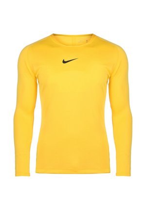 Camiseta deportiva amarilla de manga larga con el logo negro de Nike Swoosh centrado en el pecho, con diseño ajustado y cuello redondo.