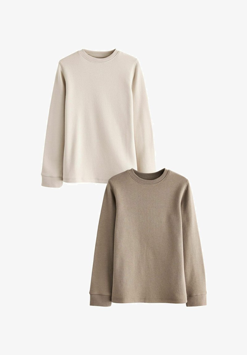 Two long-sleeve knit tops: one cream and one light brown. Each has a ribbed texture, crew neckline, and cuffed sleeves.