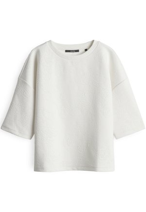 Weißes Kurzarm-Oberteil mit dezentem, floralen Präge-Muster, Rundhalsausschnitt und lockerer Passform, dargestellt vor weißem Hintergrund.