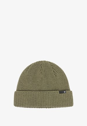 Knit beanie in olive green with a fold-up cuff. Features a textured pattern and a small black brand tag on the side.