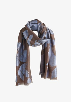 Brown scarf with large metallic blue floral patterns, loosely draped with fringed edges, on a white background.