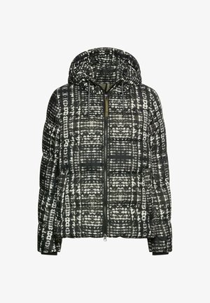 Polstret hættetrøje med et sort-hvidt geometrisk mønster, der har en frontlynlås, snor i hætten og struktur fra quiltet stof.