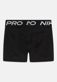 Čierne športové šortky s širokým elastickým pásom, na ktorom sú v bielej farbe nápisy "PRO" a "NIKE". Hladká tkanina s priliehavým strihom.