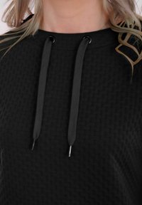 Navigazione Sweater - schwarz