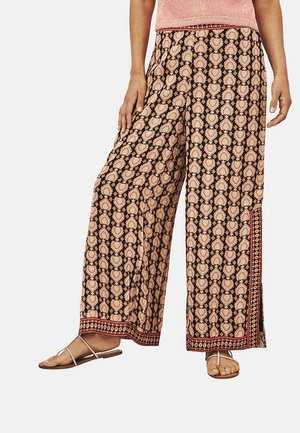 Pantalones de pierna ancha hechos de una tela suave con un estampado floral en colores rosa, negro y crema. Presentan una cinturilla estampada y una abertura lateral.