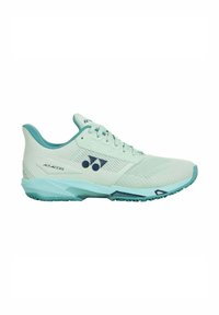 Light green athletic shoe with mesh upper, textured accents, and padded collar. Features a blue logo and sole for enhanced traction.