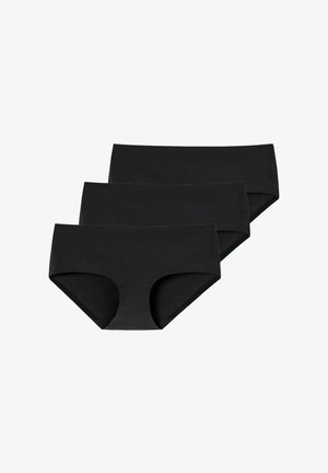 Trois sous-vêtements noirs pour femmes de style hipster, empilés sur un fond blanc.