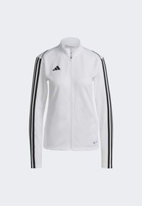 Weißer Zip-Jacke mit schwarzem Drei-Streifen-Design entlang der Ärmel, hohem Kragen und gesticktem Logo auf der linken Brust. Glattes, strukturiertes Material.