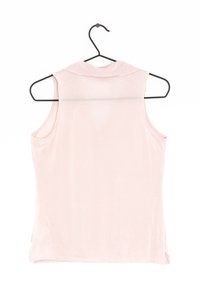 Ljusrosa ärmlös topp med krage, tillverkad av mjukt tyg. Har en rak passform, jämn textur och minimala sömnadsdetaljer.